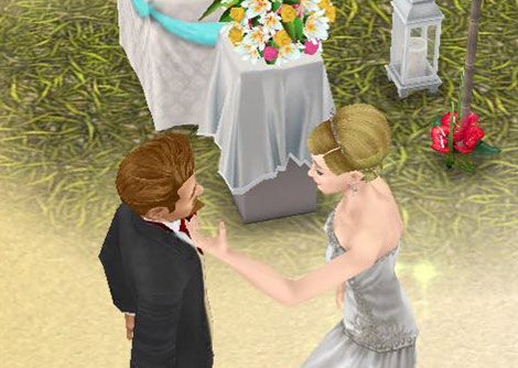 南国ロマンス島の結婚式場の前でいちゃいちゃする、タキシードとウエディングドレス姿の男女シム（The Sims フリープレイ）