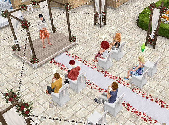 建売住宅「結婚式場」の式場で、美容セミナーを体験するシムたち（The Sims フリープレイ）